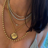 Diamond and Blue Sapphire Scallop Shell Pendant